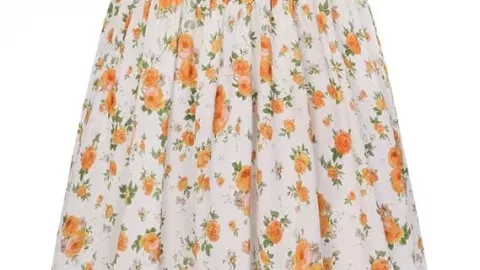 A breezy, feminine sundress with a smocked waist and delicate floral print—easy, comfortable, and beautifully spring‑ready.